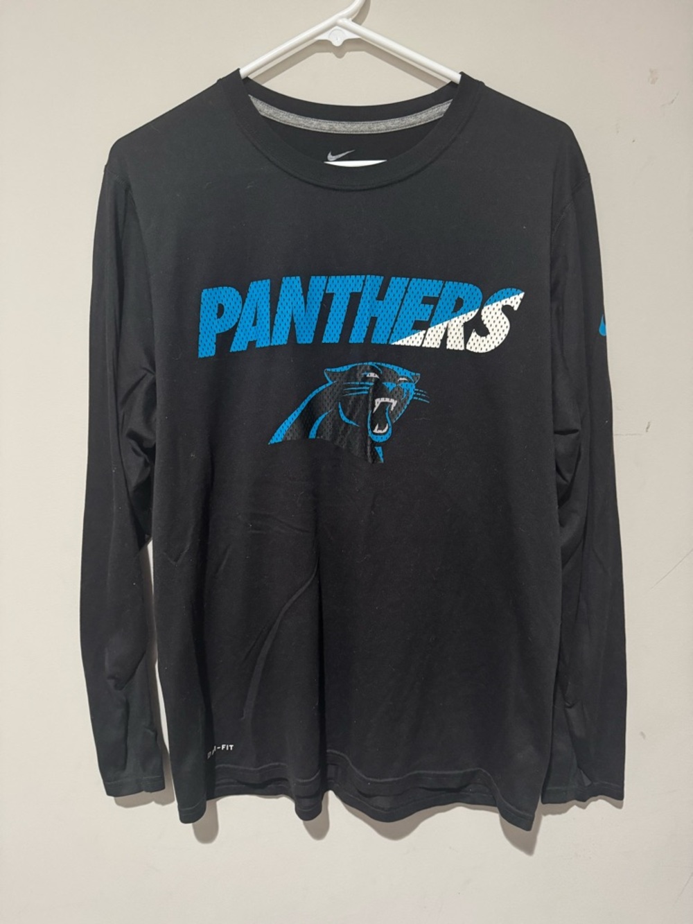 Nike Black Long-Sleeve Panthers Graphic Tee with Blue & White Logo